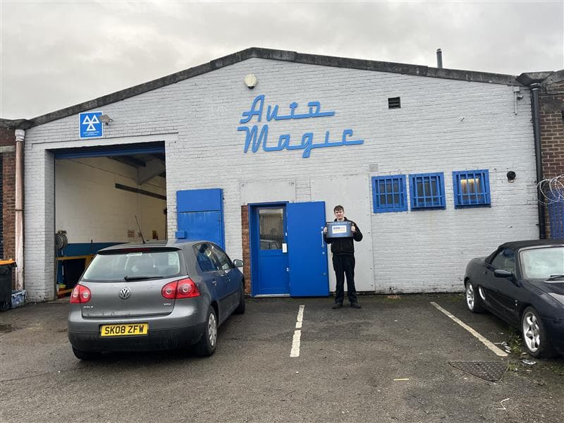 Mechanic working on a car